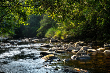 Fototapeta premium Relax scene by the riverside of Hubaotan Scenic Area, in New Taipei City, Taiwan.