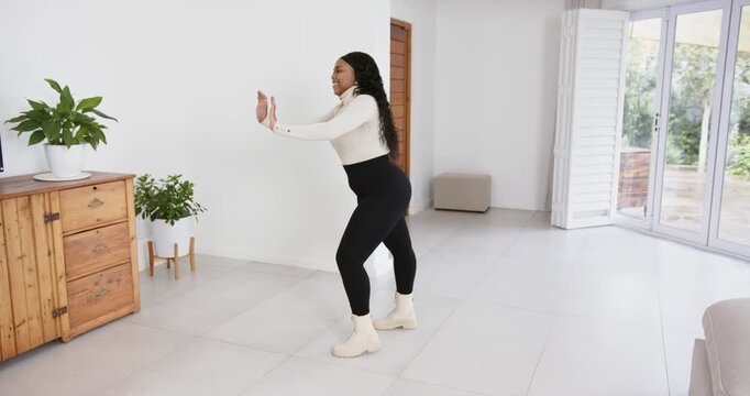 High speed photography for dynamic scenes, at home, woman pushing in living room