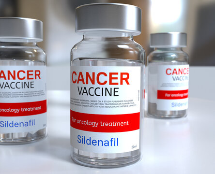 Medical worker holding a cancer vaccine and Sildenafil medication vial in a laboratory