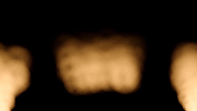 Scattered Golden Flame-Like Light Bursts Flickering on a Black Background