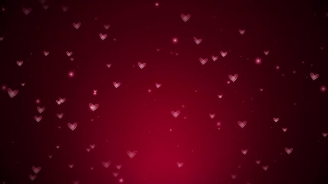 Floating transparent hearts and luminous particles on a deep red gradient background motion graphic.
