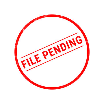 A bright red circular rubber stamp graphic featuring the bold text file pending centered inside the frame isolated on a plain white background