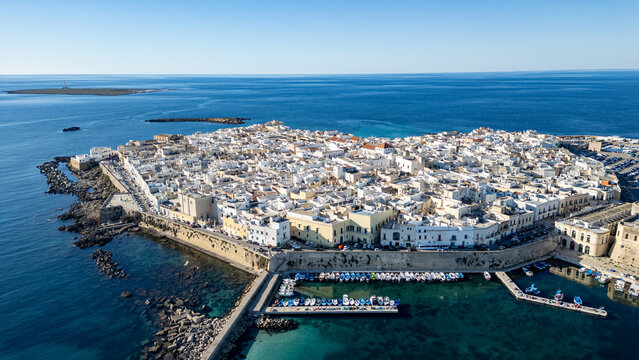 Aerial view of Gallipoli old town with fort, ramparts and harbor, Puglia, south Italy