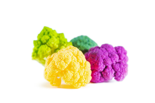 Fresh multicolored cauliflower isolated on a white background. Purple, green, and yellow florets.