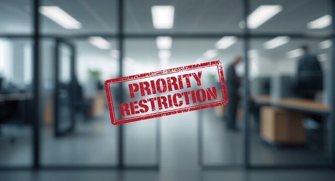 A Priority Restriction rubber stamp positioned in the center of a blurred office background, ideal for conveying urgency and importance, business, professional, document and important concept