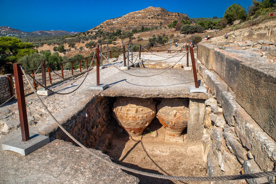 Ancient Minoan storage jars in palace storeroom at Phaistos archaeological site in Crete, Greece