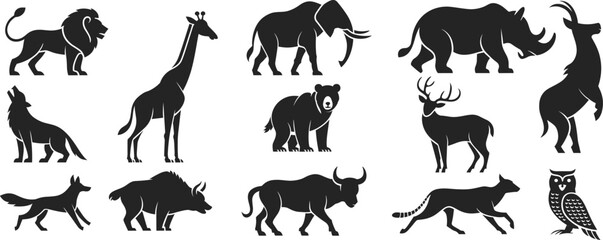 Obraz premium Set of black silhouette featuring various wild animals including a lion, giraffe, elephant, rhino, bear, deer, wolf, bull, and owl