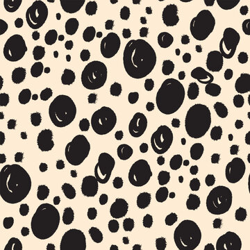 Modern leopard skin print abstract spots seamless pattern on cream beige backdrop