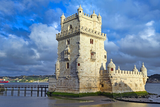 Bel&eacute;m Tower in Lisbon, Portugal at Sunset with Dramatic Clouds