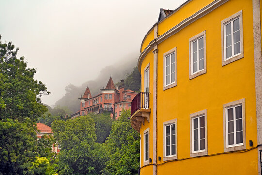 Bright Yellow Architecture and Historic Misty Palace in Sintra, Portugal