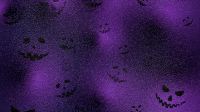 Black Halloween monster faces on a violet grainy background. Spooky pumpkin silhouettes with distressed texture. Seamless loop motion design. Video animation Ultra HD 4K 3840x2160
