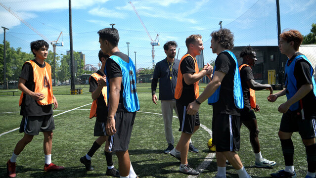 Before the match began, the referee had players from both teams shake hands to emphasize good manners,