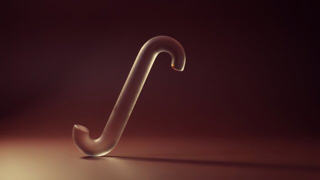 A single translucent glass integral symbol floating against a dark brown gradient studio background with background soft lighting stands upright