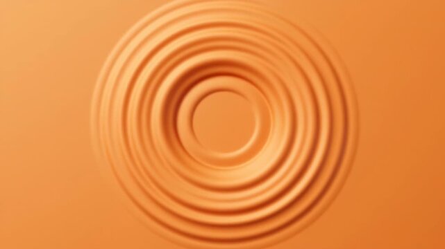 Concentric orange rings pulse and shift around a central circular depression, forming smooth wave-like ridges across a monochrome surface with soft highlights and shadowed grooves