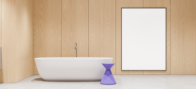 Modern minimalist bathroom interior with freestanding bathtub, blank poster mockup, wood wall panels, and purple accent table. 3D Rendering