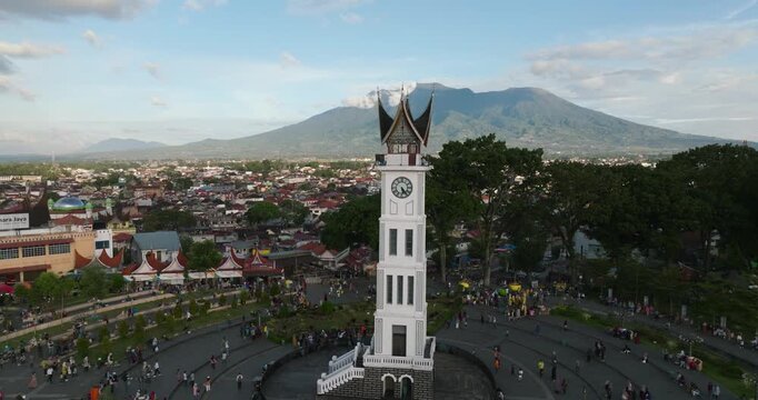 Aerial view of city square Bukitingi with clock tower Jam Gadang and tourists. Sumatra. Indonesia.