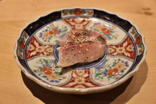 Japanese cuisine: kanpachi (greater amberjack) sashimi with aosa seaweed salt in Kyoto, Japan