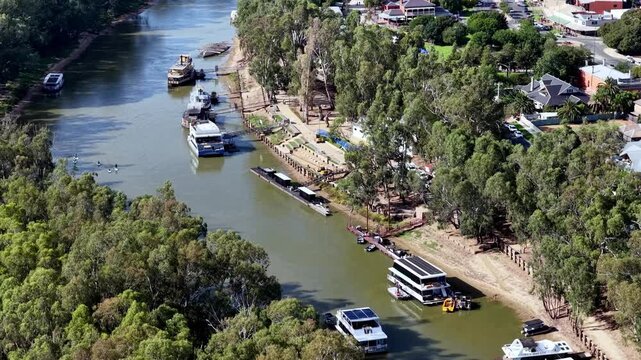 Mid aerial view of Murray river at Echuca town regional Victoria in Australia &ndash; historic boast.