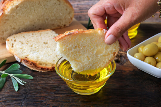 slice of sourdough bread dipped in organic olive oil