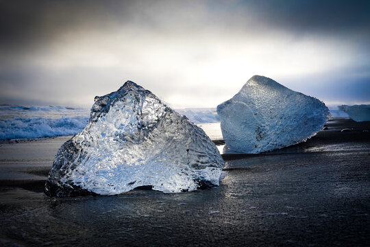 Small blue icebergs close-up view on the famous Diamond Beach, Jokulsarlon, Iceland