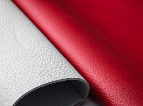 White and Red Genuine Leather Sheets Showing Natural Hide Grain and Suede Backing