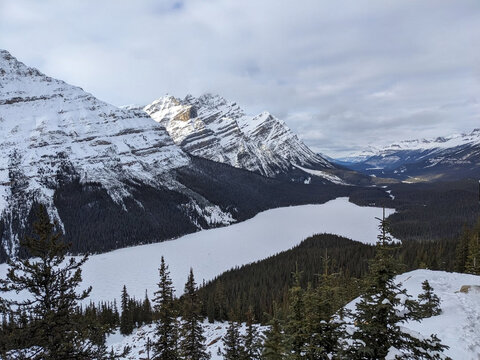 Frozen Peyto Lake Viewpoint with Snow Covered Canadian Rockies in Banff Alberta