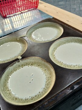 Baking Mini Martabak Manis Batter on Cast Iron Pan   Description