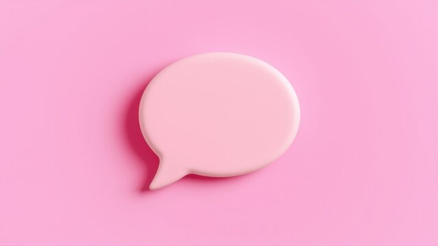 Pink speech bubble isolated. Minimalist design, flat lay, soft shadows. Simple communication concept, pastel tones, studio shot.