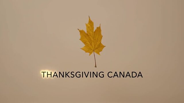 Golden maple leaf rotating on neutral background for seasonal holiday