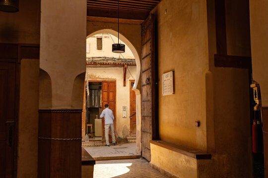 Internal yard in traditional fundouk or karavan sarai in Fes old town Medina in Morocco