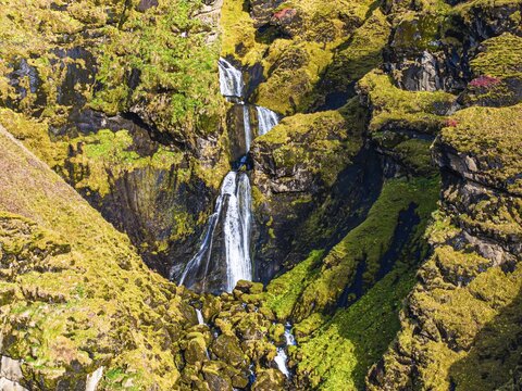 Waterfall in the rocks, near Vik, Sudurland, Iceland