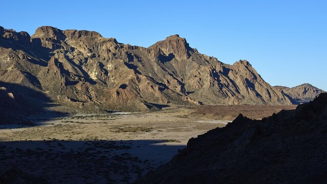 Barren rocky landscape with rolled mountains and shade along the valley, Teide, Parque Nacional del Teide, Teide National Park, volcano, volcanism, UNESCO World Heritage Site, Tenerife, Canary Islands, Spain