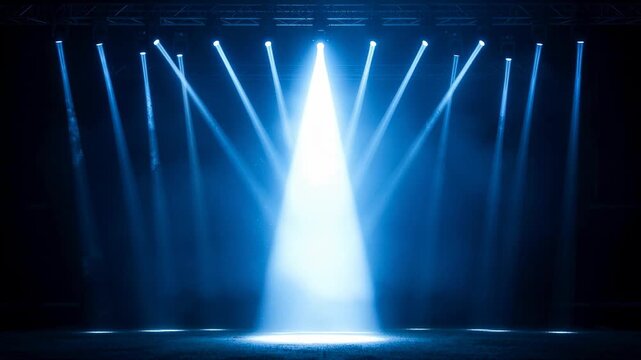 Dynamic blue stage spotlights converging in a dark atmosphere for concert event lighting