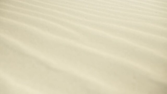 Underwater sand texture with mesmerizing sunlight reflections and caustic light patterns creating a natural relaxing background