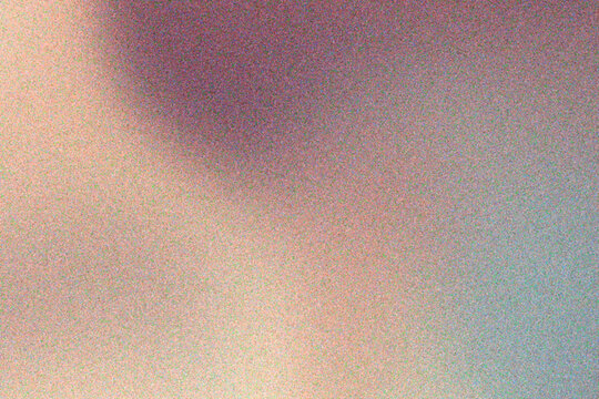 Soft colorful desert-inspired grain texture with blurred gradient background and abstract chromatic noise creating a warm atmospheric visual surface