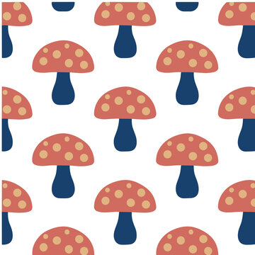 Seamless pattern of red mushrooms with yellow spots