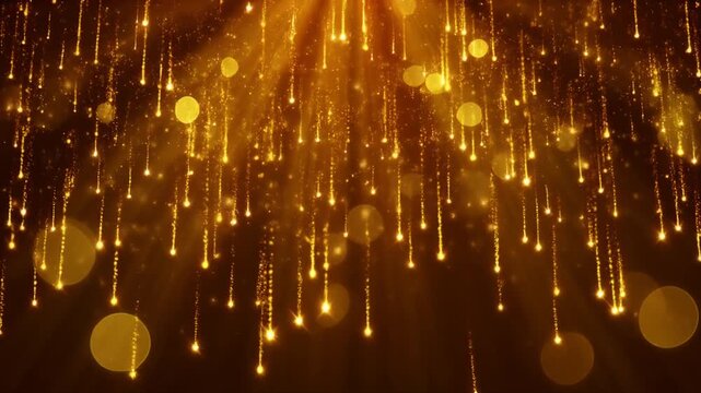 琥珀色の背景に差す暖かな光芒の中で金色の粒子と玉ボケが上から下へ降り注ぐ抽象映像