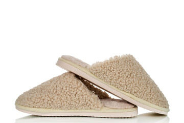 Insulated slippers on a white background, macro shot. © Oleksandr