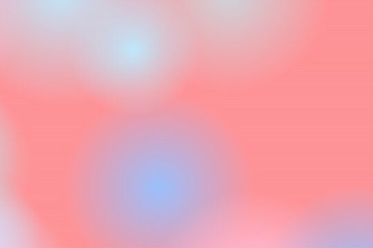 Soft coral pink bokeh background with blue blurred highlights