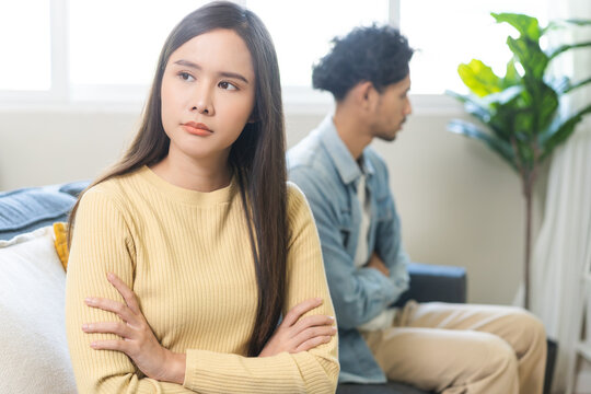 Breakup and depressed, asian young quarrel couple love fight relationship in trouble. Different people are emotion angry. Argue wife has expression upset with husband. Problem of family people.