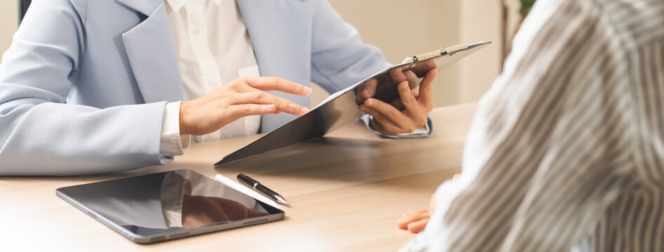 Asian young manager, employer woman interview with person, business owner have question about resume and listen to candidate answer, conversation together at office. Recruitment employee job concept.