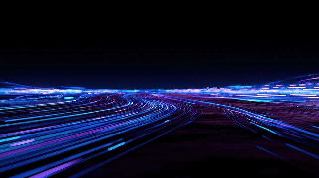 Abstract streaks of blue and purple light trails on dark background