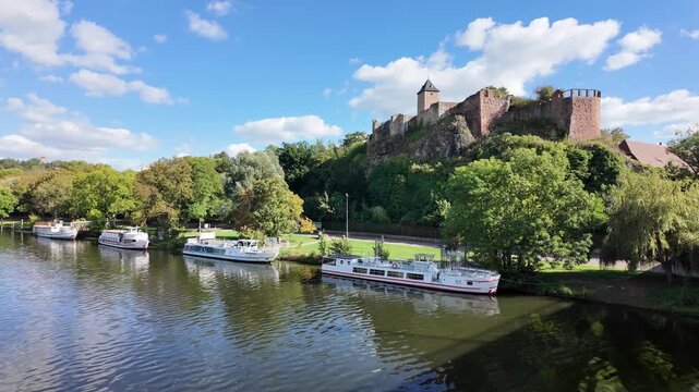view from Giebichenstein-Bridge to Burg Giebichenstein (Castle Giebichenstein) in Halle (Saale), idyllic landscape with tour boats on the Saale River, saxony-anhalt, germany, 2026