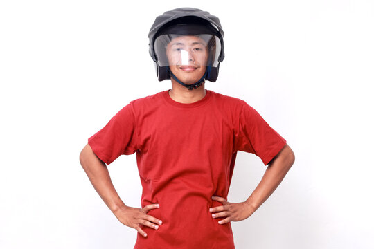 Asian delivery worker wearing motorcycle helmet isolated on white background