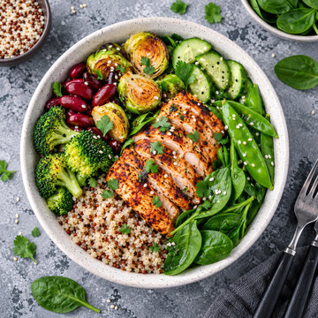 Healthy buddha bowl lunch with grilled chicken