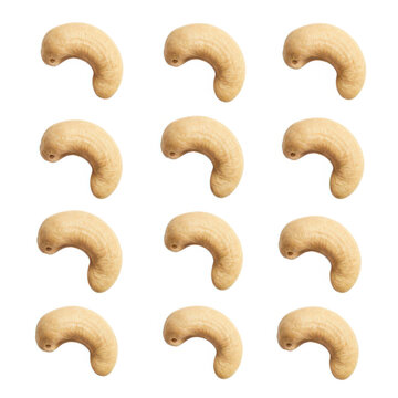 Many roasted cashew nuts arranged in a neat pattern isolated on white background