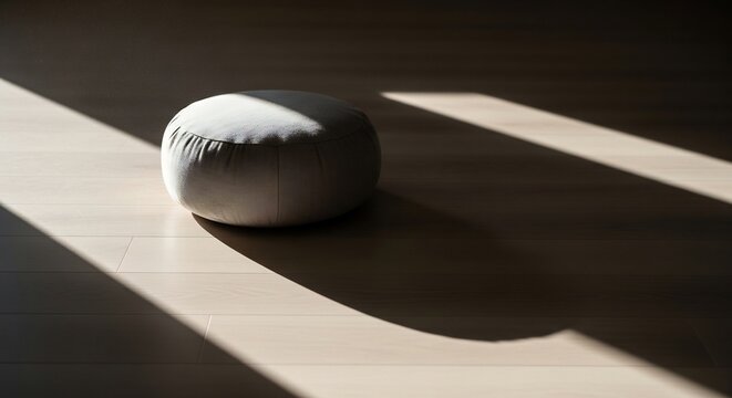 Peaceful meditation space with a cushion in spring sunbeams