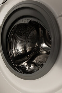 Close-up view inside an open washing machine drum