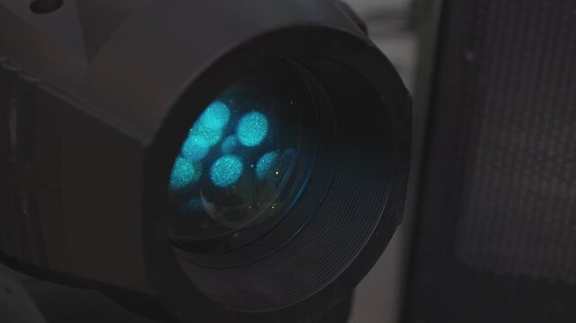 Yellow stage light illuminating indoor scene