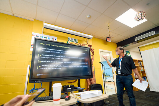 Teacher leading an education workshop